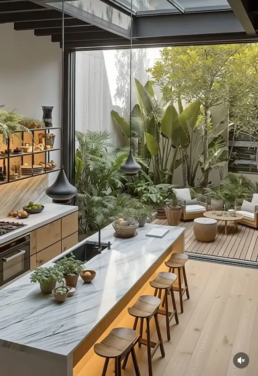 Apostar por muebles cómodos, con líneas similares a las del living, refuerza la idea de continuidad.