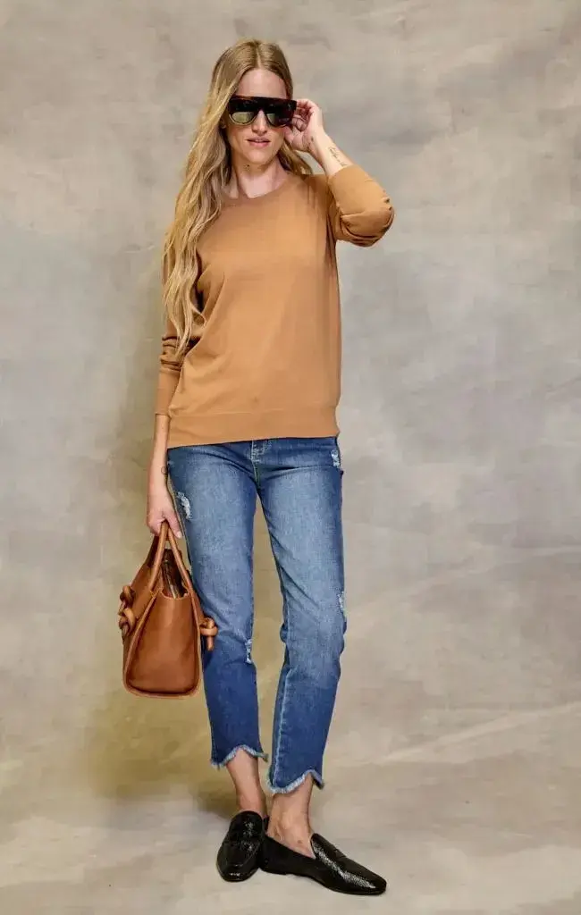 Esta fecha es ideal para conseguir ítems básicos, este sweater es una gran opción (MIRTA ARMESTO-$ 152.810 )