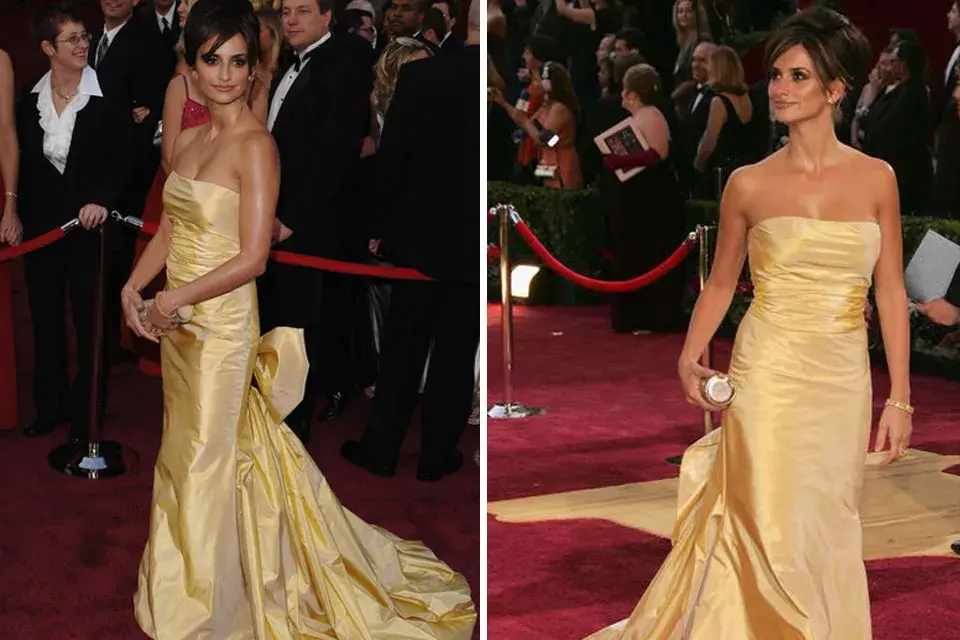 Penélopez Cruz, en los Academy Awards de 2005, con un diseño color dorado, escote palabra de honor y gran moño en la cola