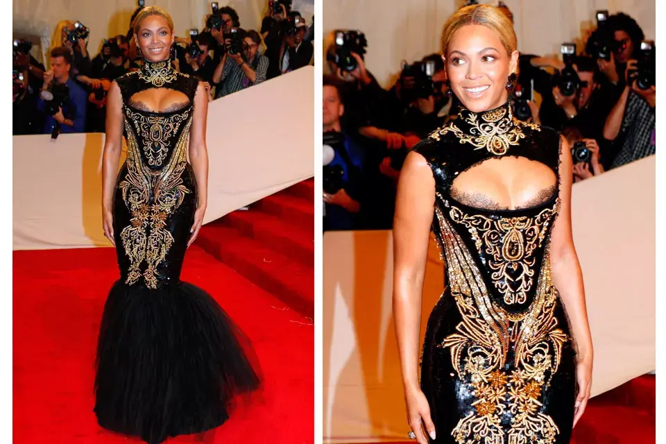 Ajustada y recargada...a Beyoncé se la vió un poco incómoda con su vestido de Emilio Pucci de silueta sirena en negro con bordados en dorado