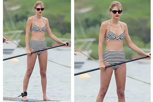 Taylor Swift con un traje de baño al mejor estilo de los años 50, de cintura alta en color blanco con rayas negras