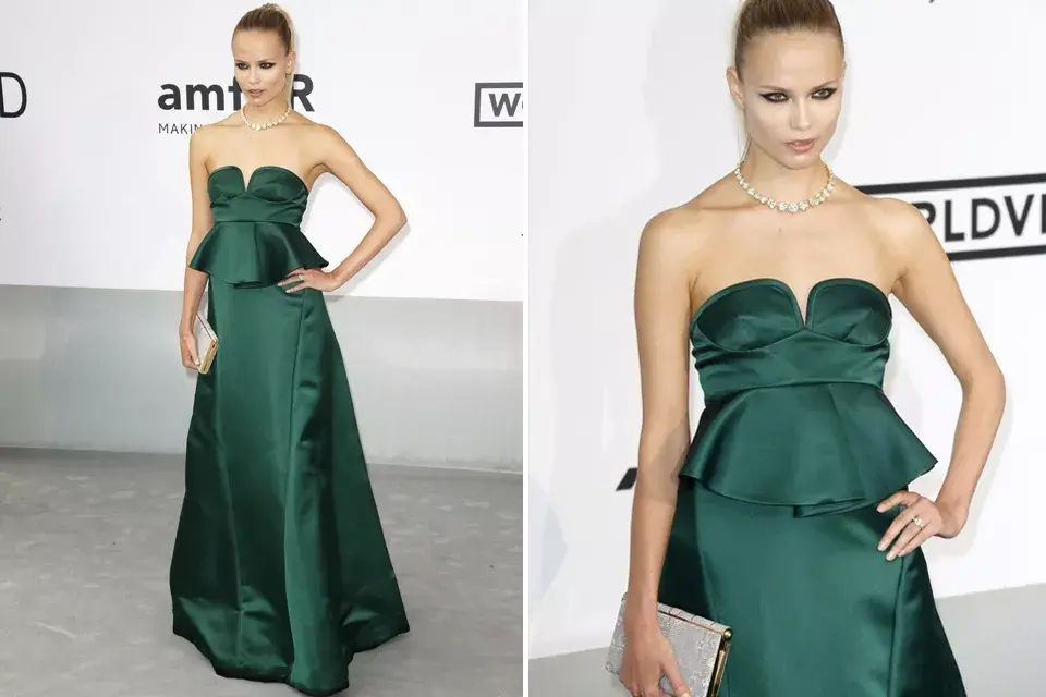 Natasha Poly, divina con un look en verde botella, también de escote corazón y péplum ¿Qué opinás?