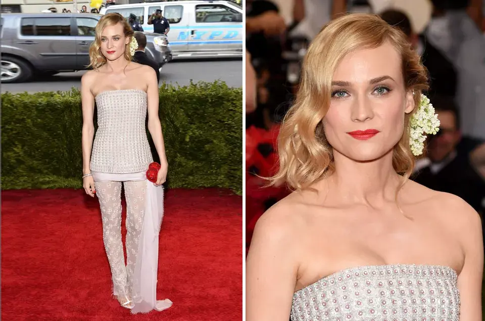Diane Kruger optó por un diseño con pantalones, de Chanel Alta Costura y clutch de Judith Leiber