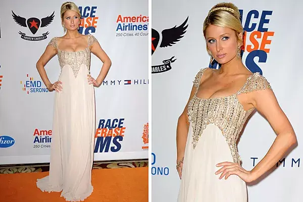 Siempre fiel a su estilo, Paris Hilton eligió un vestido blanco de corte imperio con piedras bordadas