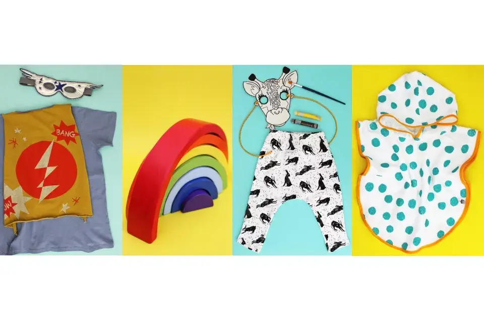 Superhéroe, remera con capa $450 y antifaz $250 de Hilo sin Fin / Arcoiris de madera $450 de Choque los Cinco / Pantalón blanco y negro niño $380 de Malmo / Mascaras para pintar $240 de Trim Toys / Ponchito de toalla $350 de From Beirut /