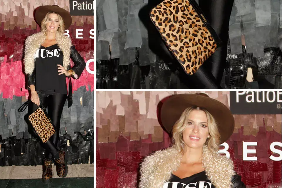 Mery del Cerro con un look recargado: sombrero, chaleco de piel, calzas, botas animal print y sobre en el mismo género. ¡Todo muy lindo, pero por separado!