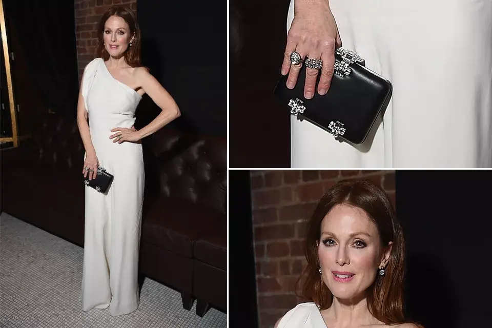 Julianne Moore parece que mejora con la edad: esta vez se puso un vestido blanco con escote asimétrico y clutch negro de Alexander McQueen. El make up, impecable
