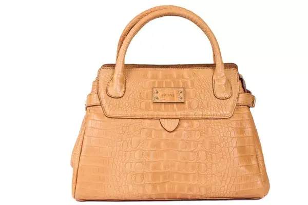 Baúl de croco semirrígido (Prüne, $879)