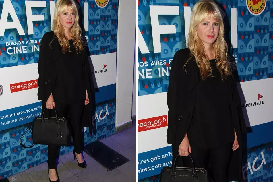 Esmeralda Mitre muy elegante con un look en negro que incluye capa, pantalones chupines y stilettos