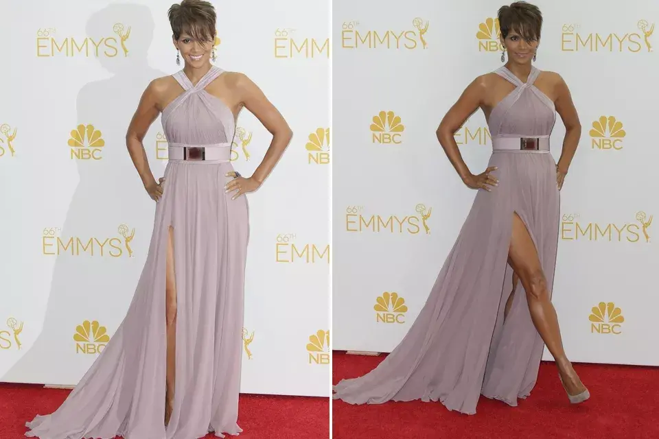 Halle Berry muy sexy con un diseño de Elie Saab. La actriz optó por un vestido color rosa empolvado con escote cruzado y cinturón con detalle metálico