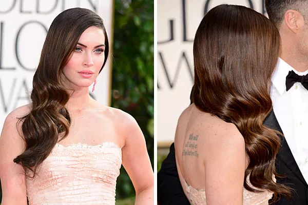 Megan Fox eligió un peinado bastante simple, con bucles suaves en el largo del pelo y lo usó hacia el costado