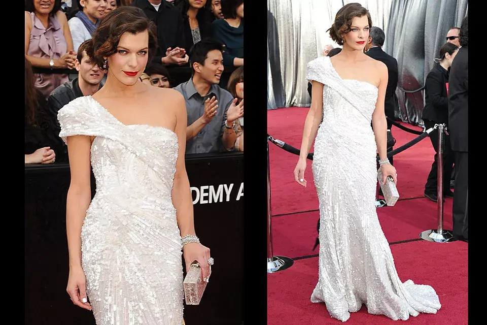 ¿Cuál será el secreto de de Milla Jovovich para estar cada día más linda? En la alfombra roja dejó a todos con la boca abierta con su vestido blanco y plateado de Elie Saab Couture de un solo hombro