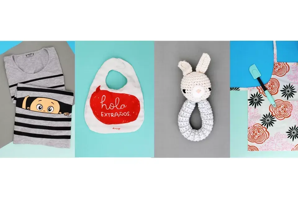 Remera para mamis embarazadas $265 de Que será? / Babero $130 y sonajero tejido $300 de Ble Blé Pequeña Tienda / Delantal niños $378 de Bla Bla Textiles /