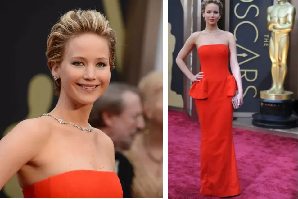 Con un vestido strapless rojo de Dior, Jennifer Lawrence no hace caso a las supersticiones y se luce con ese color