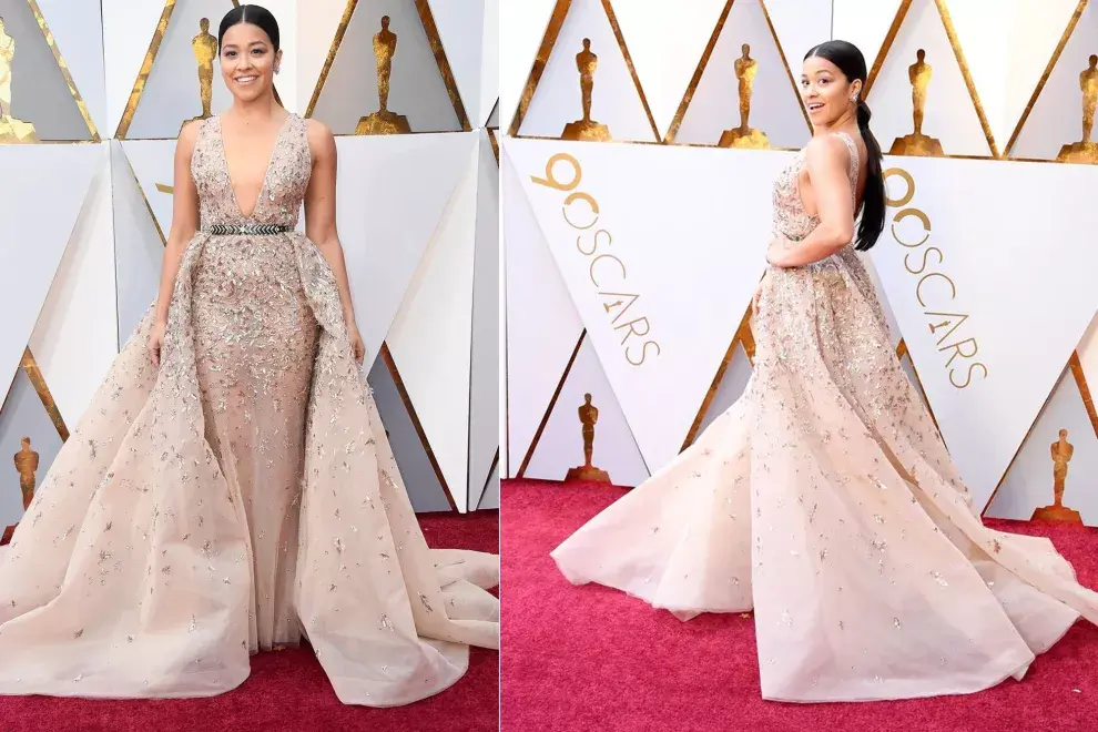 Gina Rodriguez, con un clásico vestido con piedras bordadas y cola de Zuhair Murad 