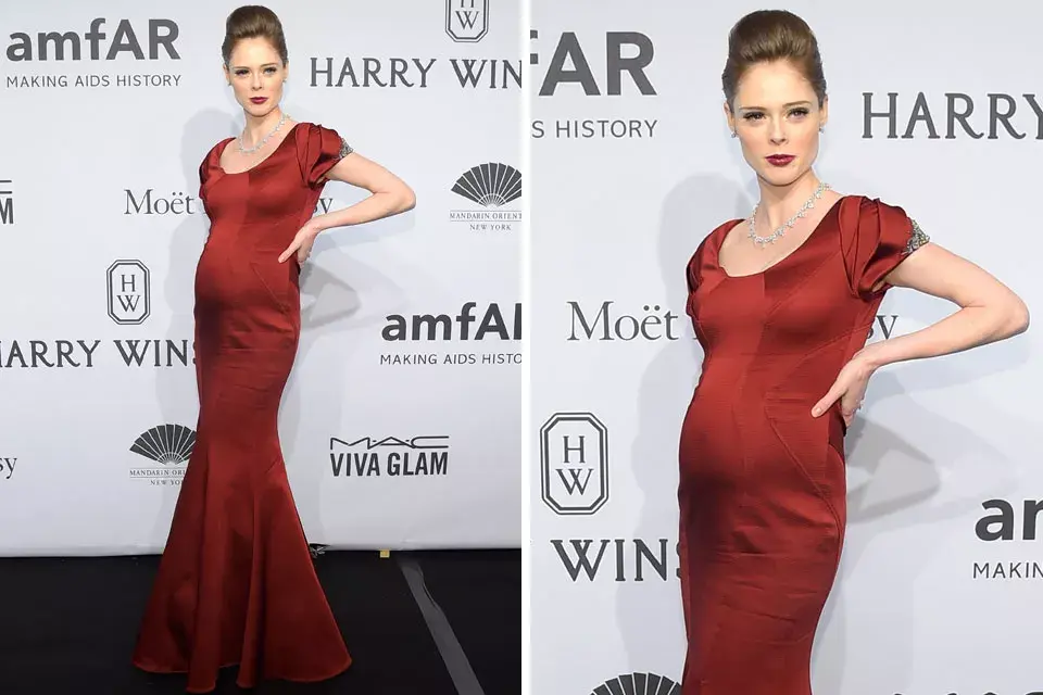 Coco Rocha presumió de su embarazo con un vestido color granate de Zac Posen