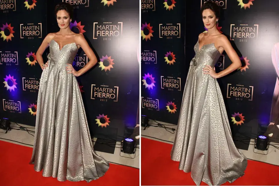 Paula Chaves optó por  dos diseños de Gabriel Lage. En este caso, un vestido con escote en picos y gran falda en color gris