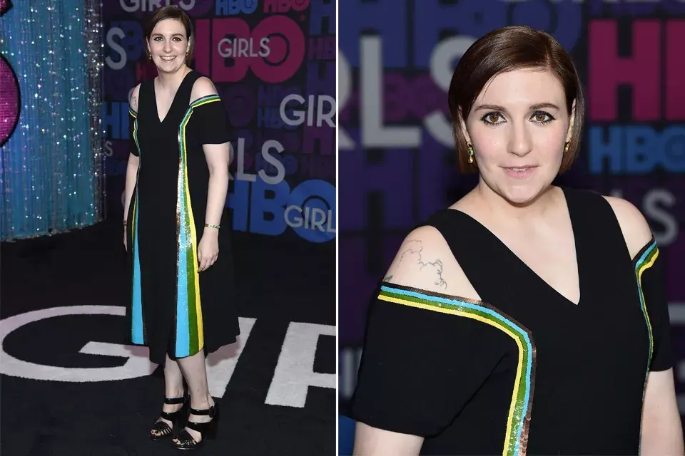 Lena Dunham optó por un vestido negro midi con los hombros al aire y pequeños toques de color de la firma Creatures of the Wind. Acompañó el vestido (menos escandaloso que otros que le hemos visto) con sandalias negras