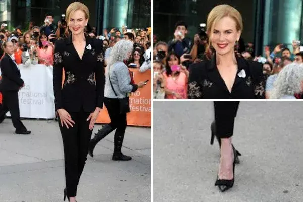 Nicole Kidman, en cambio  sorprendió con un outfit masculino: traje negro con detalles de encaje y zapatos Louis Vuitton