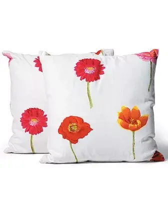 Almohadones de percal estampados (Flox, $55 cada uno)