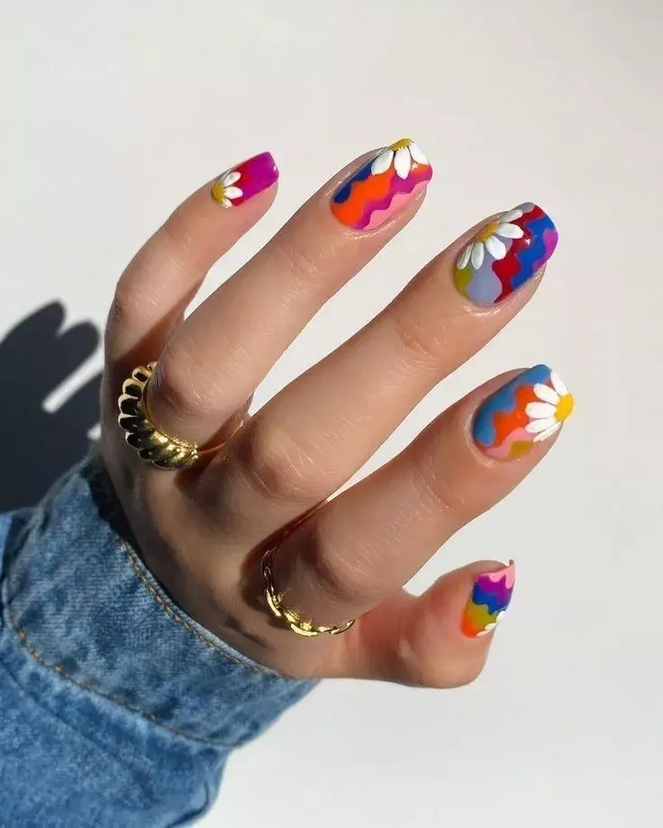 Uñas rainbow con flores