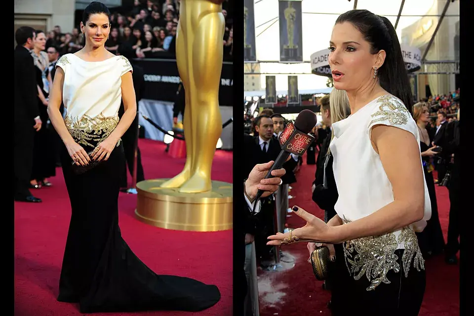 Fanática de Marchesa, Sandra Bullock volvió a ponerse uno de sus diseños, en este caso, un vestido blanco y negro con hojas bordadas en dorado (¿no les da la sensación de que le queda grande la parte de arriba?)