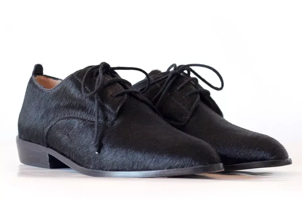Acordonados negros (Mäna, $1952)