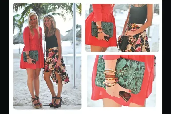 Vestido corte princesa rojo con falda balloon y manga larga, ideal para un clutch verde de pitón. Remera básica negras y falda estampada con cola. Ellas hacen un buen dúo