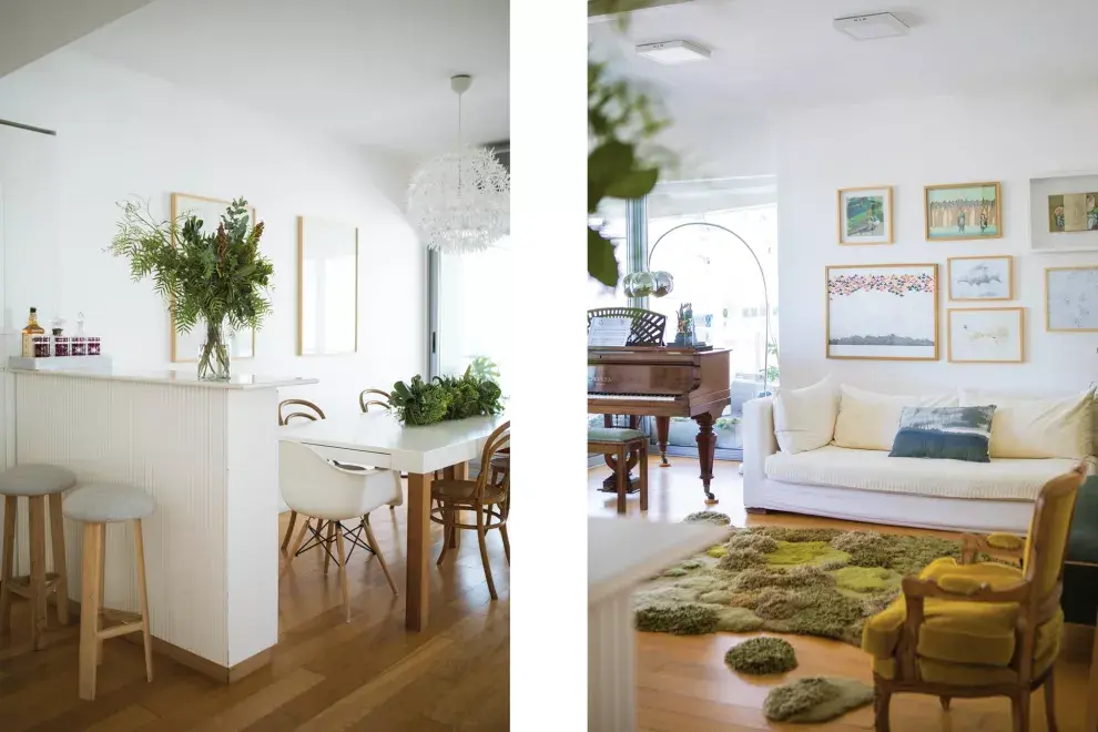 El bar funciona como recibidor y divide los espacios: lo diseñó ella, reutilizando el Silestone Blanco Zeus de su anterior barra de cocina. A la mesa de comedor con patas de pinotea le agregó un cajón para guardar servilletas y manteles. Ambos muebles los materializó Kasa Design. Los arreglos verdes