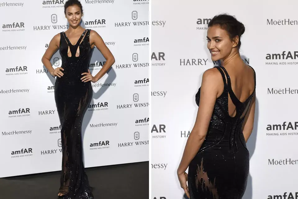Irina Shayk de negro, con un vestido muy sensual con aberturas, transparencias y brillos. Una verdadera bomba sexy