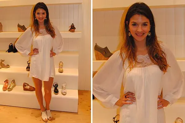 Marcela Kloosterboer apostó al look total white para visitar el local de Justa Osadía; ¿qué te parece este vestido de mangas anchas y encaje?