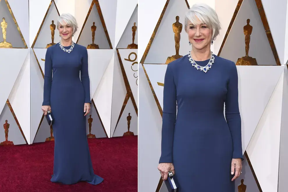 Helen Mirren, con un vestido de mangas largas en tono "azul real" acompañado por un collar de zafiros