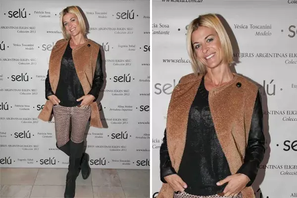 Eugenia Tobal estuvo en el evento de Selú con un tapado de mangas de cuero, un chupín engomado y botas de caña bien alta. Siempre con las últimas tendencias