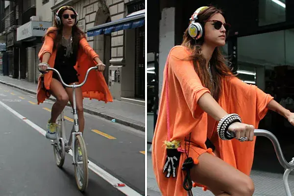 Look en naranja el de Calu Rivero en el video Please Me, de Poncho. Mucha onda!