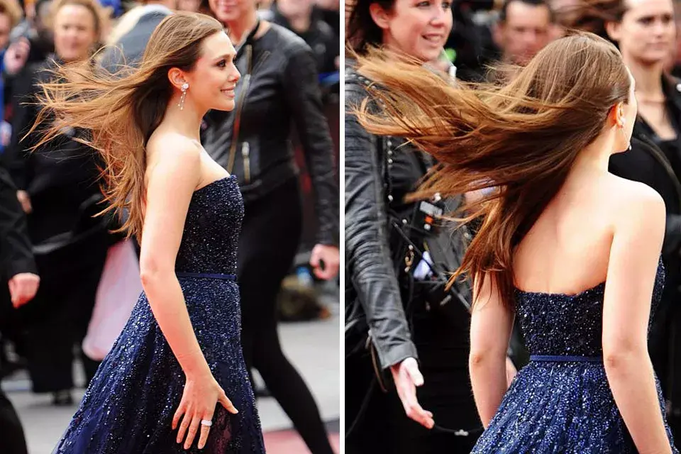 Elizabeth Olsen posó divina para los flashes en el momento que pasó una ráfaga de viento. ¡Chau pelo súper lacio!