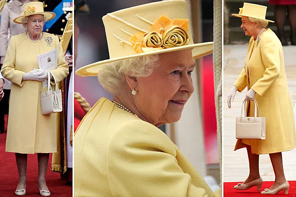 La reina Isabel II sorprendió con la elección del color amarillo de su vestido, de un corte muy típico de los que suele usar
