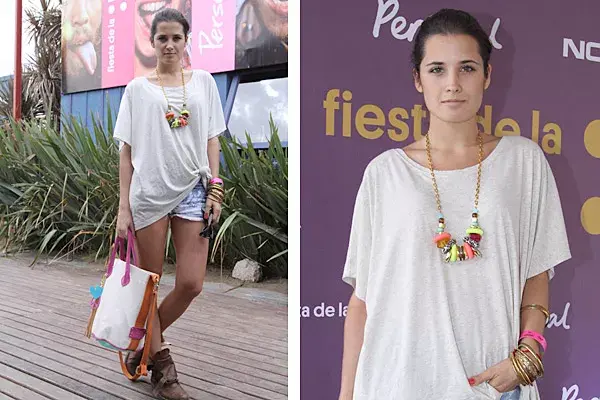 Con un look muy casual, Flor Torrente fue a la fiesta de Personal y aprovechó para lucir una de las carteras que diseño de manera exclusiva para Lázaro