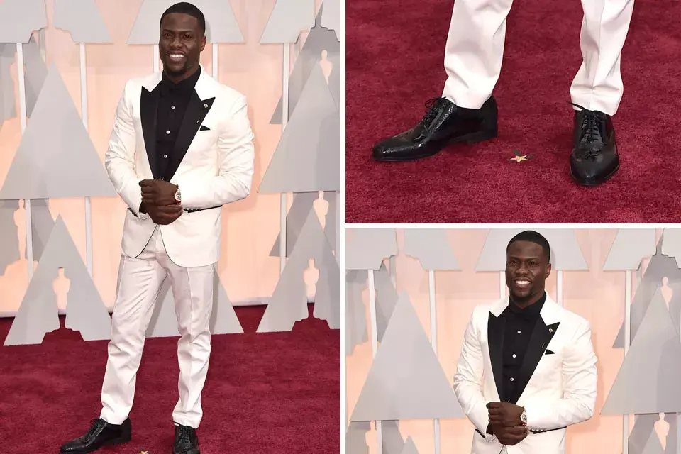 El actor y comediante Kevin Hart se decidió por el blanco y negro para caminar por la alfombra roja. ¿Te parece elegante?
