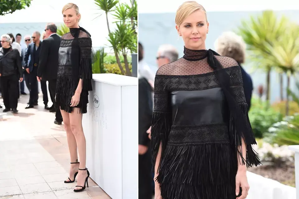 Charlize Theron esta vez eligió un look de Valentino en total black. ¡Perfecta, como siempre!