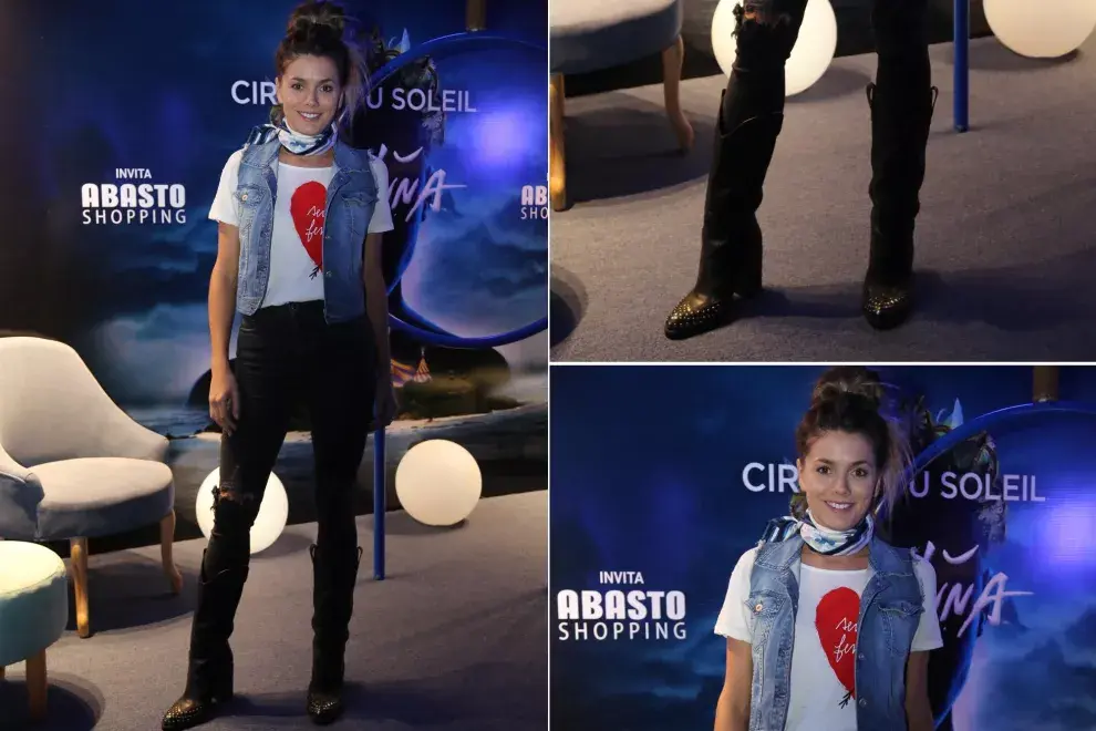 Canchero y muy fiel a su estilo el look de Natalie Perez para ir al estreno del show Amaluna del Cirque Du Soleil: remera blanca, chaleco de jean, pañuelo al cuello, jeans rotos y botas texanas, que son furor