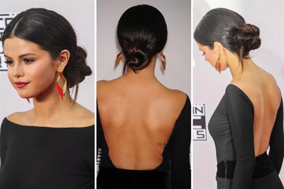 y sumamos a esta lista el peinado impecable de Selena Gomez: chignon bajo, perfecto para el vestido que eligió con espalda bien descubierta