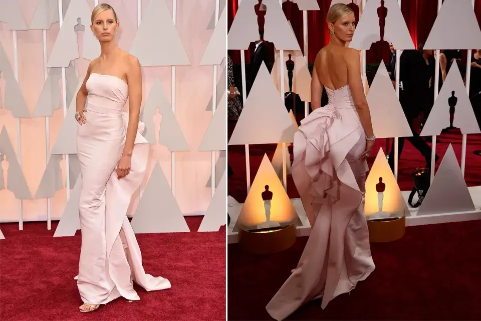 La modelo Karolina Kurkova destacó su figura con un Marchesa en rosa claro. ¡Muy valiente la elección de la cola del vestido!