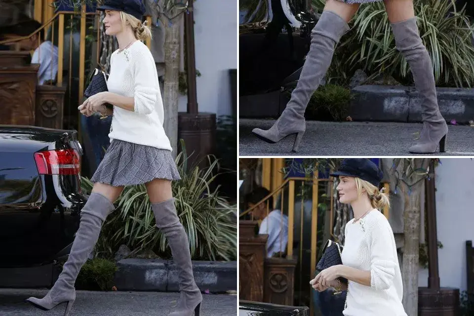 Ya quisiéramos tener esas piernas para pasear con esas maxibotas y lucir como Rosie Huntington Witheley. Aunque sea un "look al estilo mujer bonita" le damos el ok porque esta rubia sí sabe llevar las tendencias de moda