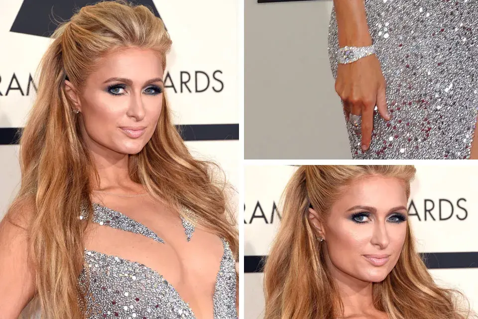 Paris Hilton optó por un peinado semi recogido y extensiones para aportar volumen. Como accesorios, aros de brillantes bien pequeños y un reloj que se llevó todas las miradas