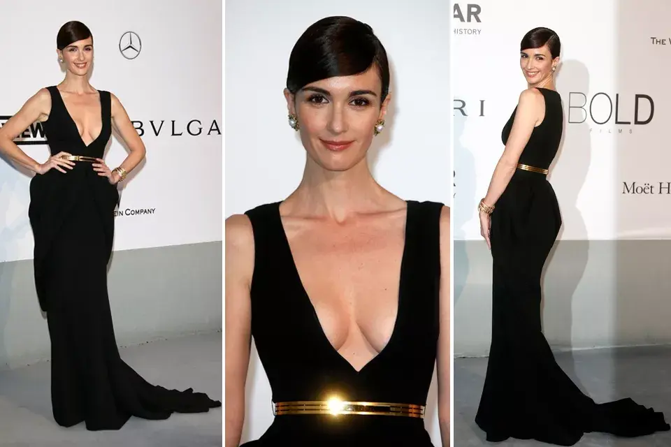 Paz Vega, otra de las famosas que desfiló por la red carpet e hizo gala de su look. La actriz lució un vestido  con gran escote, péplum, cola y cinturón dorado a la cintura ¿De quién era el diseño? ¡Fitriani Couture!