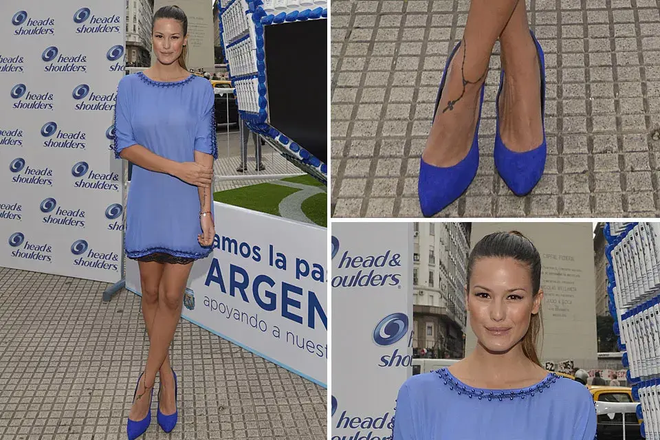 ¿Qué te parece el look de Luli Fernández? Eligió un  vestido azul con mangas tres cuartos, apliques y encaje. Los stilettos, en el mismo tono. ¡Un outfit para alentar a la Selección!