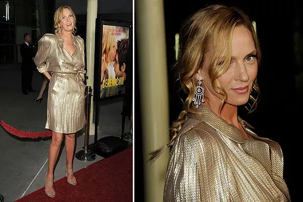 Uma Thurman, con un conjunto dorado, con un lazo en la cintura, botones y mangas amplias