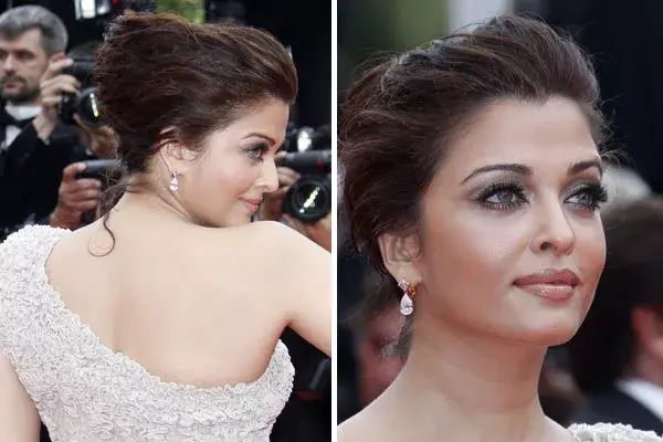 Aishwarya Rai eligió un peinado semirrecogido, ideal para usar con un vestido que tiene un solo hombro