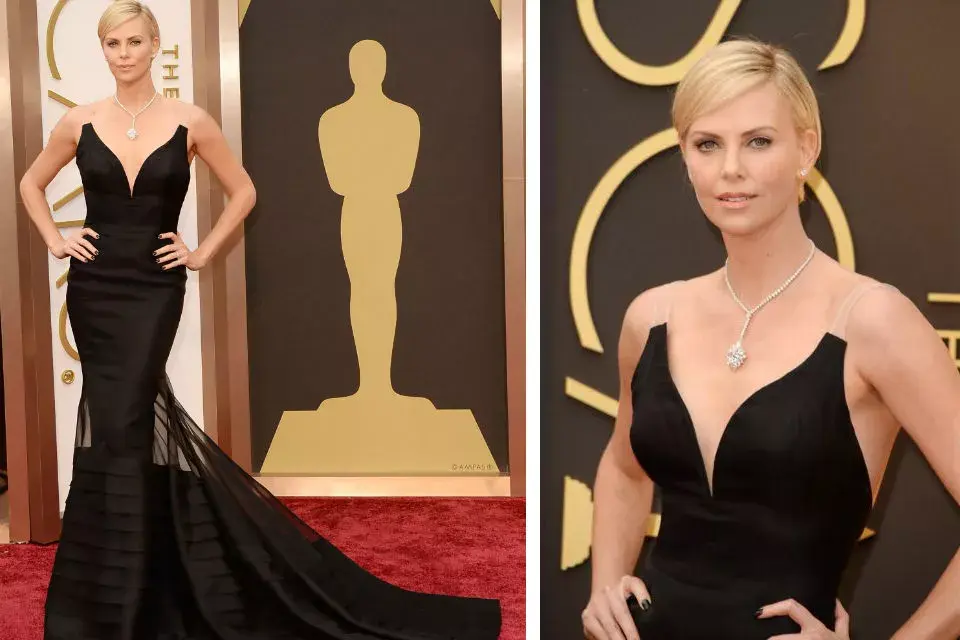 Mucho glamour para Charlize Theron en un vestido negro de Dior. ¡Impecable!