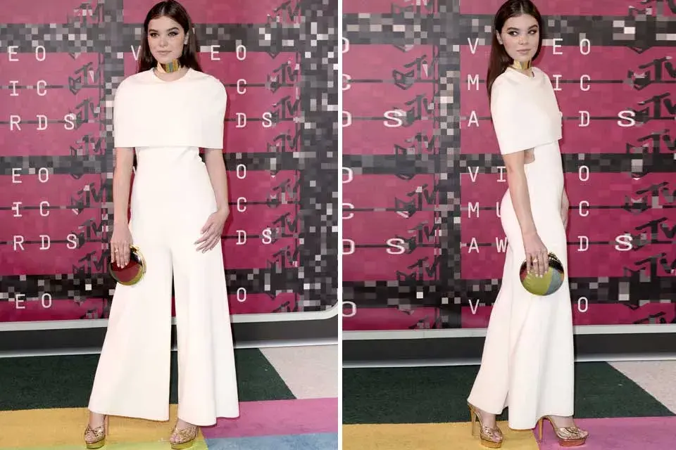 Hailee Steinfeld impactó con un mono blanco con pantalones campana y capa by Stella McCartney. Completó su look con accesorios minimalistas que iban a la perfección con el equipo